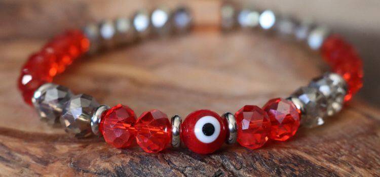 what does the red eye mean on a bracelet