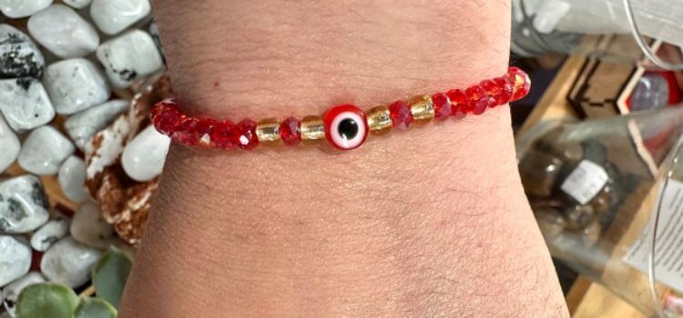 what does the red eye mean on a bracelet